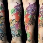Ligera-Ink-Tattoo-Milano-Tattoo-cartoon-Tatuaggi-cartoni-animati-tattoo-cartoon-tatuaggi-disney-tatuaggio-alice-nel-paese-delle-meraviglie-migliori tatuatori milano tatuaggio stregatto tatuaggio alice nel paese delle meraviglie