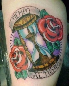 clessidra-tattoo-clessidra-tatuaggio-clessidra-ligera-ink-tatuaggi-colorati-tatuaggi-milano-tattoo-milano-tatuatori-milano-studio-di-tatuaggi-milano-migliori-tatuatori-milano